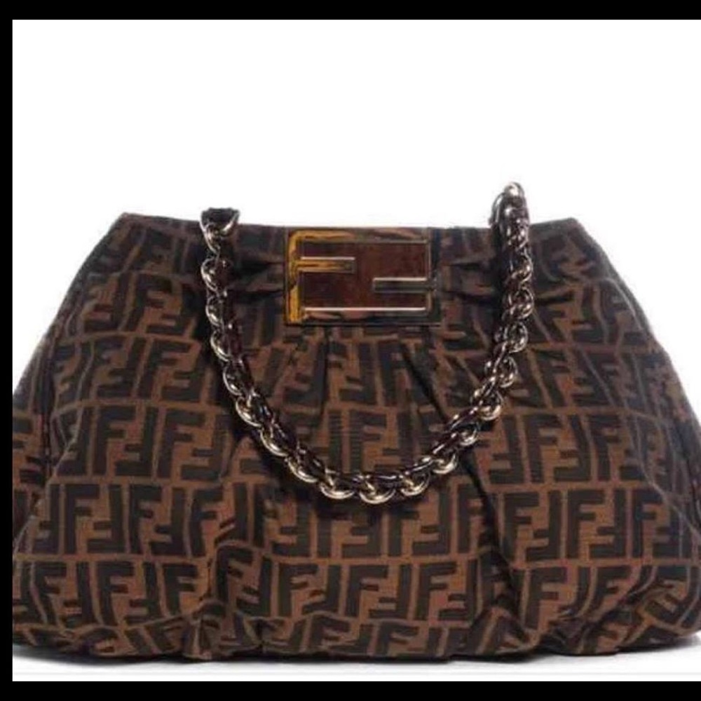 Pre own authentic Fendi Zucca bag